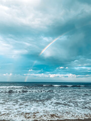 Double rainbow over sea