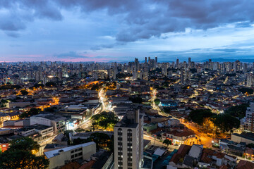 São Paulo with sunset and pink sky and night, metropolis, South America, Brazil