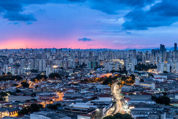 São Paulo with sunset and pink sky and night, metropolis, South America, Brazil
