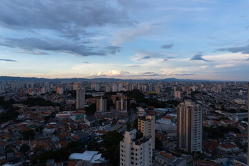 Naklejka na ściany i meble São Paulo with sunset and pink sky and night, metropolis, South America, Brazil