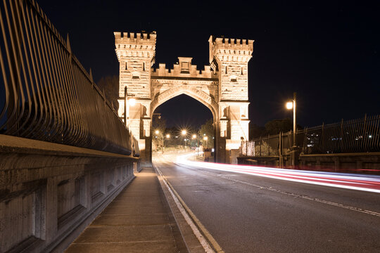 old historic sandstone bridge night blurred car lights motion drive crossing long exposure