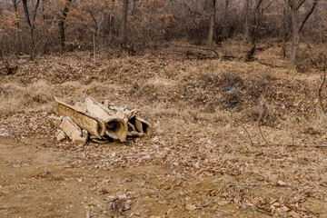 Sections of broken culvert laying on ground