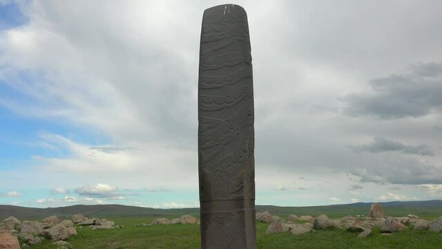 Deer stones are ancient megaliths carved with symbols. Grave deerstone deerstones funerary or commemorative purposes. Kurgan stelae kurgans historical antique menhir standing orthostat old 4K