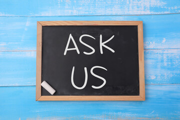 Ask Us, text words typography written on chalkboard, life and business motivational inspirational...