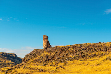 Fototapeta na wymiar Chullpa or Inca tomb tower in Sillustani, Peru.