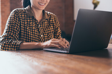  work using computer hand typing laptop keyboard contact us online chatting search form internet sitting at office.concept for technology device communication business people