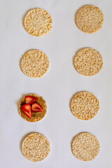 rice crackers, whit fruits on table blue
