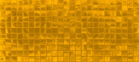 Shiny gold tiles or stones background pattern