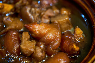One pot of delicious Chinese food, sweet and sour pork knuckle ginger