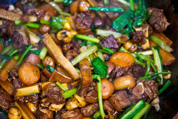 A pot of tempting Chinese food, dry pot of lamb