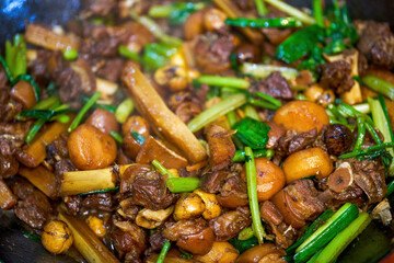 A pot of tempting Chinese food, dry pot of lamb