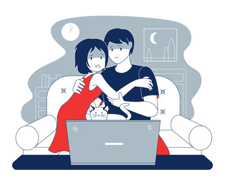 Couple watching horror movie from the laptop in midnight
