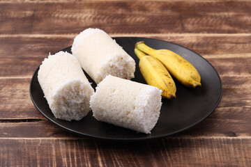 White raw rice Puttu/Pittu_wooden background