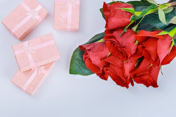Pink gift boxes with and beautiful red roses. Valentines Day.