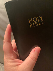 Holy Bible in a Hand