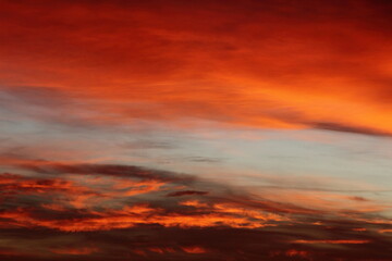 Fototapeta premium colored clouds at early morning sunrise 