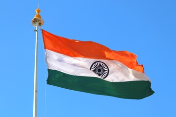 The national flag of India. Fabric tricolor flag. Indian republic day. Independence day.
