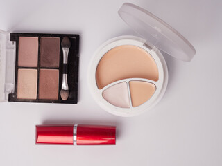 Set of decorative cosmetics on a white background. Flat lay, top view.
