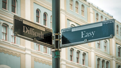 Obraz premium Street Sign to Easy versus Difficult