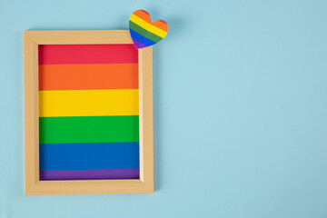 Fototapeta premium Photo frame, LGBT simbol, homosexual on blue background