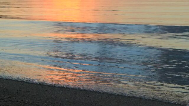 sunset beach and healing sound waves in Okinawa Ishigaki island Sukuji beach