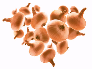Ripe onion in the shape of a heart on a white background