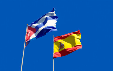 Flags of Spain and Cuba.
