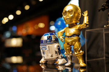 Fototapeta premium C-3PO & R2D2 fictional character figures in Ximending Mall, Taipei. Both are robot character in the Star Wars franchise created by George Lucas. TAIPEI, TAIWAN - JUNE 26, 2018.