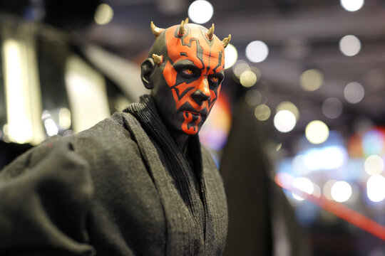 Close up of Darth Maul fictional character figures in Ximending Mall, Taipei. He serves as a Sith Lord and a master of wielding a double-bladed lightsaber.