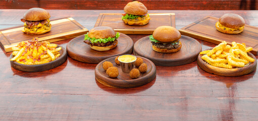 fast food board burgers with fried entrees with extra cheese and delicious arne