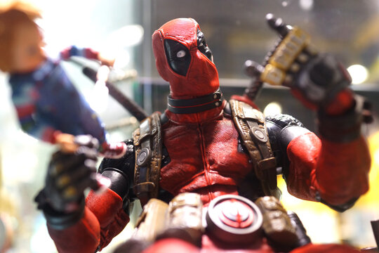 Close up of Deadpool figures on display shelf in Ximending Mall. Deadpool is a American superhero film based on the Marvel Comics character of the same name. TAIPEI, TAIWAN - JUNE 26, 2018.
