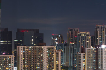 Fototapeta na wymiar Cityscape of residential building in the night