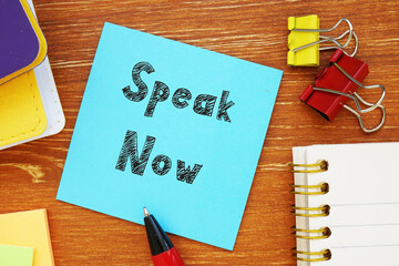 Financial concept meaning Speak Now with inscription on the page.