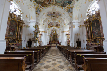 Fototapeta na wymiar View along the main aisle of the church of Schäftlarn Abbey towards the altar