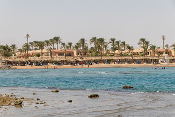 Fototapeta na wymiar Hurghada, Egypt - September 29 2020: People relaxing on the beach in Hurghada, Egypt.