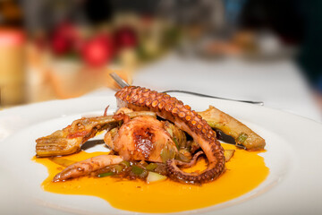 Delicious plate of delicious octopus and artichoke