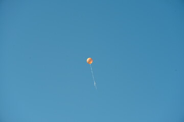 a lonely balloon flies into space