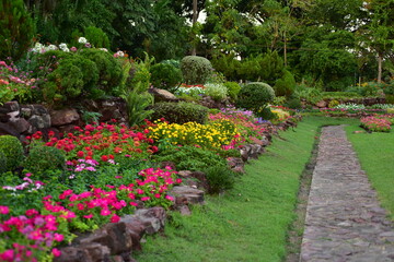 Spring Formal Garden. Beautiful garden of colorful flowers.Landscaped Formal Garden. Park. Beautiful Garden	