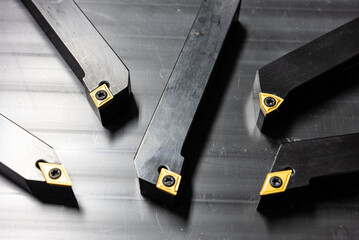 Coated carbide cutting tools for lathe use. Turning cutter with mechanical fastening. Equipment for the lathe on metal. Metal-cutting equipment for cnc machines.