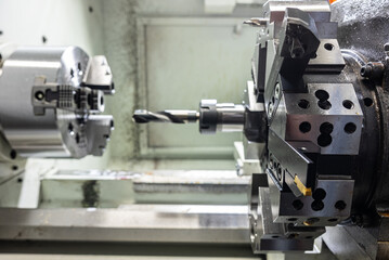 Cnc machine. The CNC lathe machine or Turning machine. Turning numerical control machine with tools and chuck.