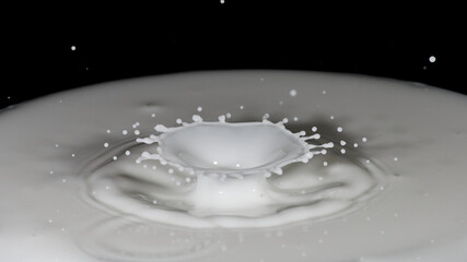 Chapoteo de gotas de leche formando una corona perfecta