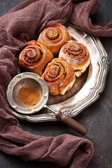 Homemade rolls with cinnamon and sugar. Selective focus