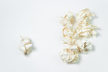 Crumpled paper on a white background. A pile of crumpled paper. Creative crisis. Lack of ideas