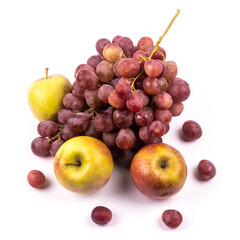 Naklejka na ściany i meble Bunch of grapes and apples on white background