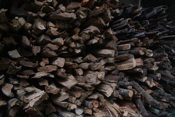 Pile of wood for firewood, seen from the end of the wood