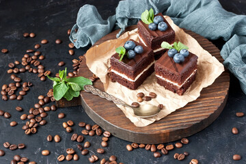 Chocolate cake with blueberries and chocolate cream