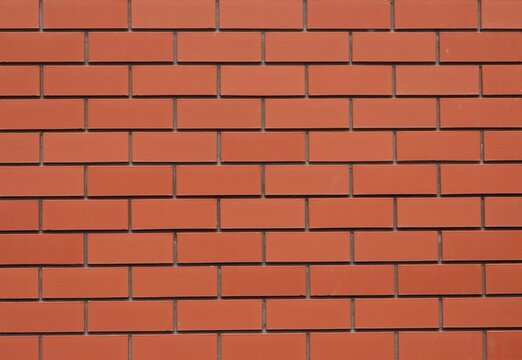 Rectangle brickwork texture. Red brick masonry background. Stonework pattern wallpaper