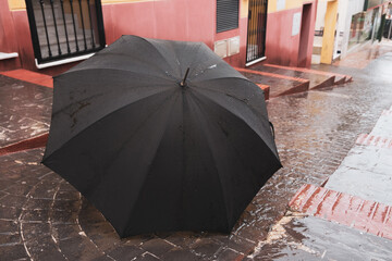 Umbrella on the street on a rainy day