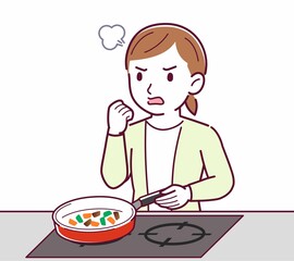 Young woman in a cardigan_cooking