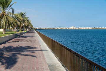 Fototapeta na wymiar Kalba Corniche in Sharjah United Arab Emirates (UAE) on a beautiful day walking along the Gulf of Oman near the city.